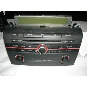 Radio : MAZDA 3 05 reciever/tuner, w/trim panel/display, AM FM CD, exc 