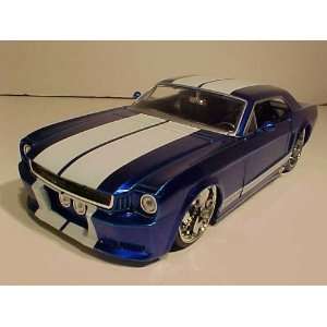    1965 Ford Mustang GT candy Blue with White Stripe: Toys & Games