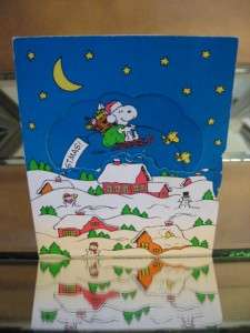 1965 Hallmark Peanuts Christmas card (that changes view). Very rare 