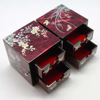 Red jewelry box inlaid with mother of pearl 4drawers The four gracious 