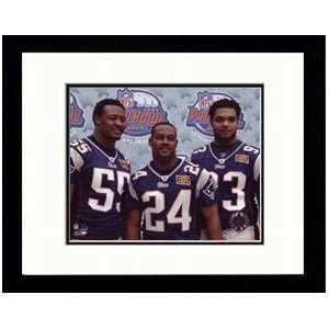  Willie McGinest, Ty Law, and Richard Seymour are pictured 