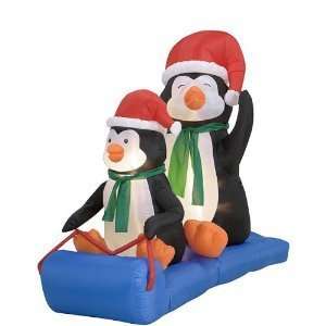    Airblown Inflatable 6 Ft Long Penquins on a Sled