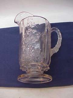 ANTIQUE PATTERN GLASS EAPG~PANELED GRAPE FOOTED PITCHER  