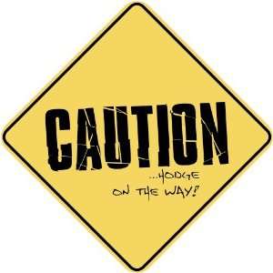     CAUTION  HODGE ON THE WAY  CROSSING SIGN