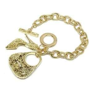   Gold Tone Filigree Handbag and High Heel Charm 7 Toggle Bracelet