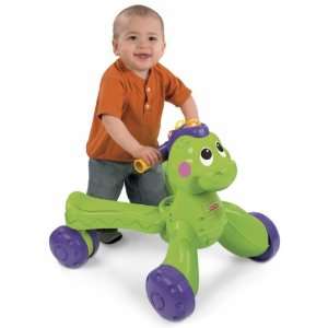  Fisher Price Go Baby Go! Stride to Ride Dino: Toys & Games