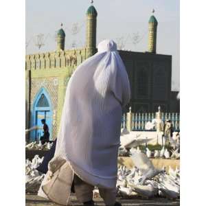 Lady in Burqa Feeding the Famous White Pigeons at the Shrine of Hazrat 