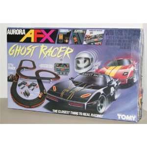    Tomy   Ghost Racer Slot Car Race Set (Slot Cars): Toys & Games