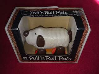5H33 VINTAGE TOMY PULL N ROLL DOG TOY NEW IN BOX 1980,  